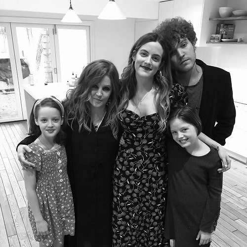 A picture of Benjamin Keough with his siblings and mother.
